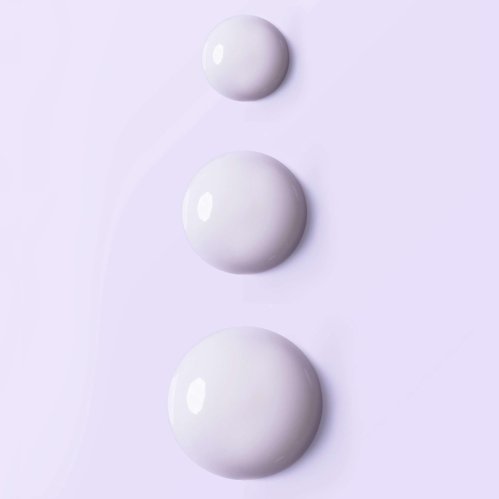 Esthederm Intensive Vitamin C Serum 3 white beads on lavender background on Tampa Home & Garden Store