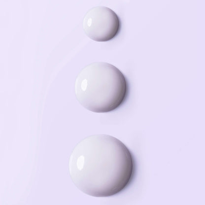 Esthederm Intensive Vitamin C Serum 3 white beads on lavender background on Tampa Home & Garden Store