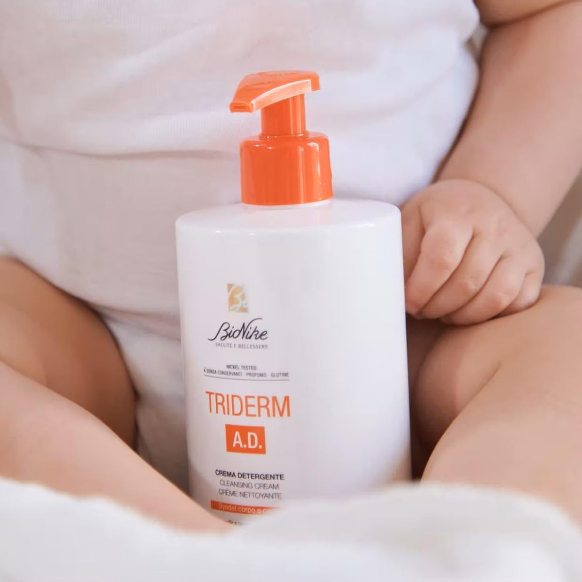 BioNike Triderm A.D cleansing cream bottle with orange pump on white container on Tampa Home & Garden Store