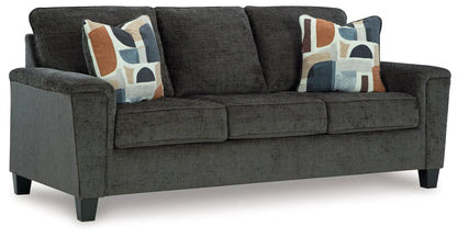Erinslane stationary chair & ottoman in dark gray fabric with pillows on Tampa Home & Garden Store