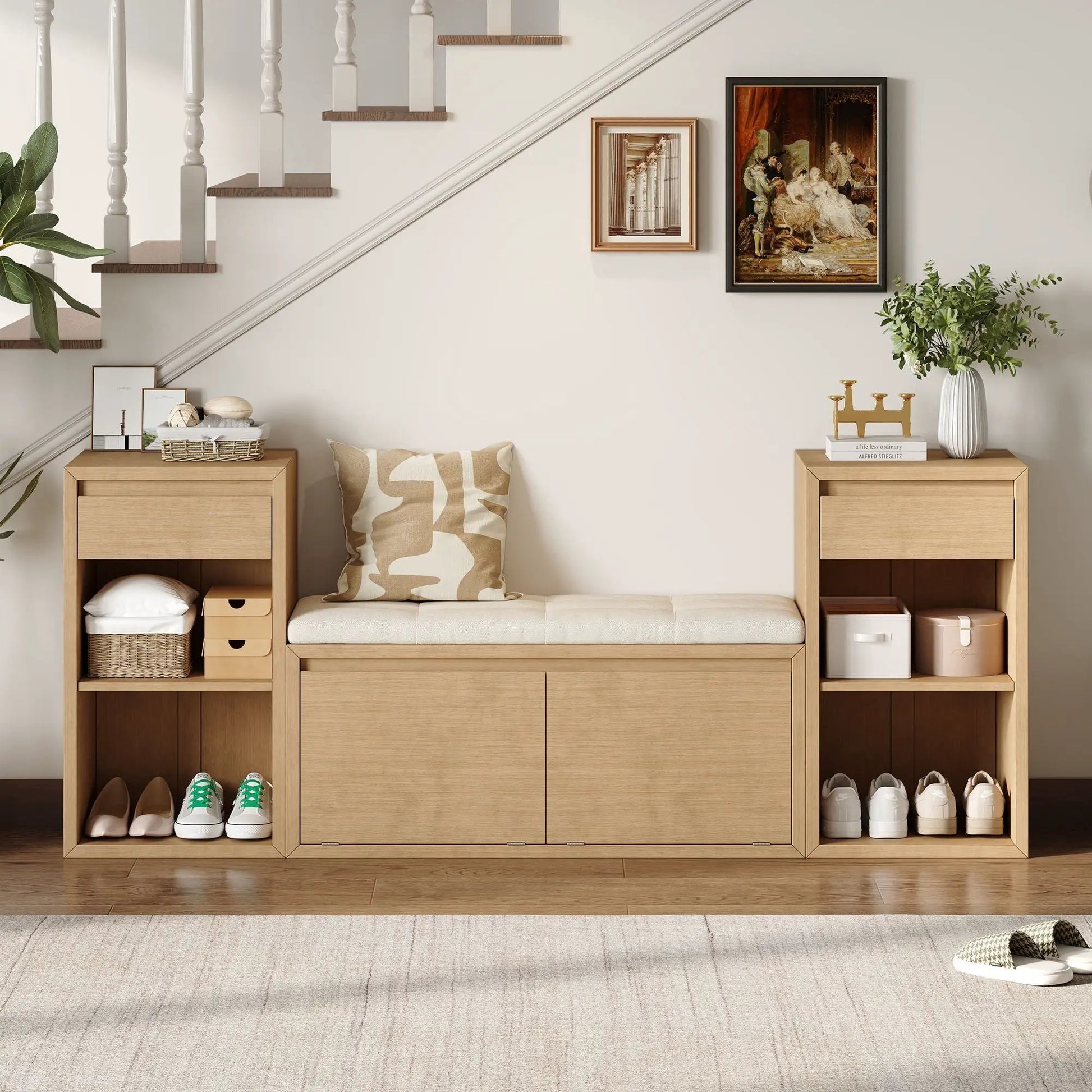 Entryway storage bench with cushion, drawers and open shelves flanked by light wood towers on Tampa Home & Garden Store