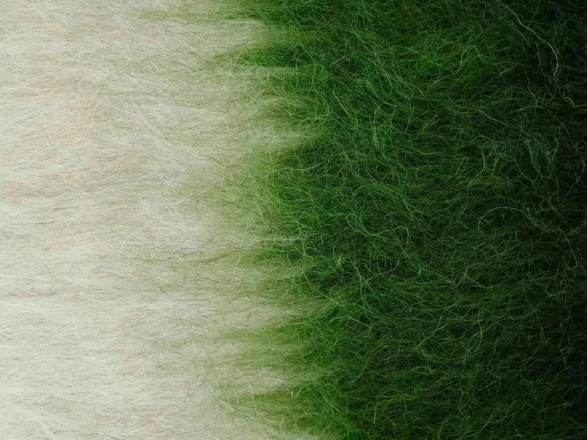 Handwoven wool pillow fabric in emerald green and cream with brushed texture on Tampa Home & Garden Store
