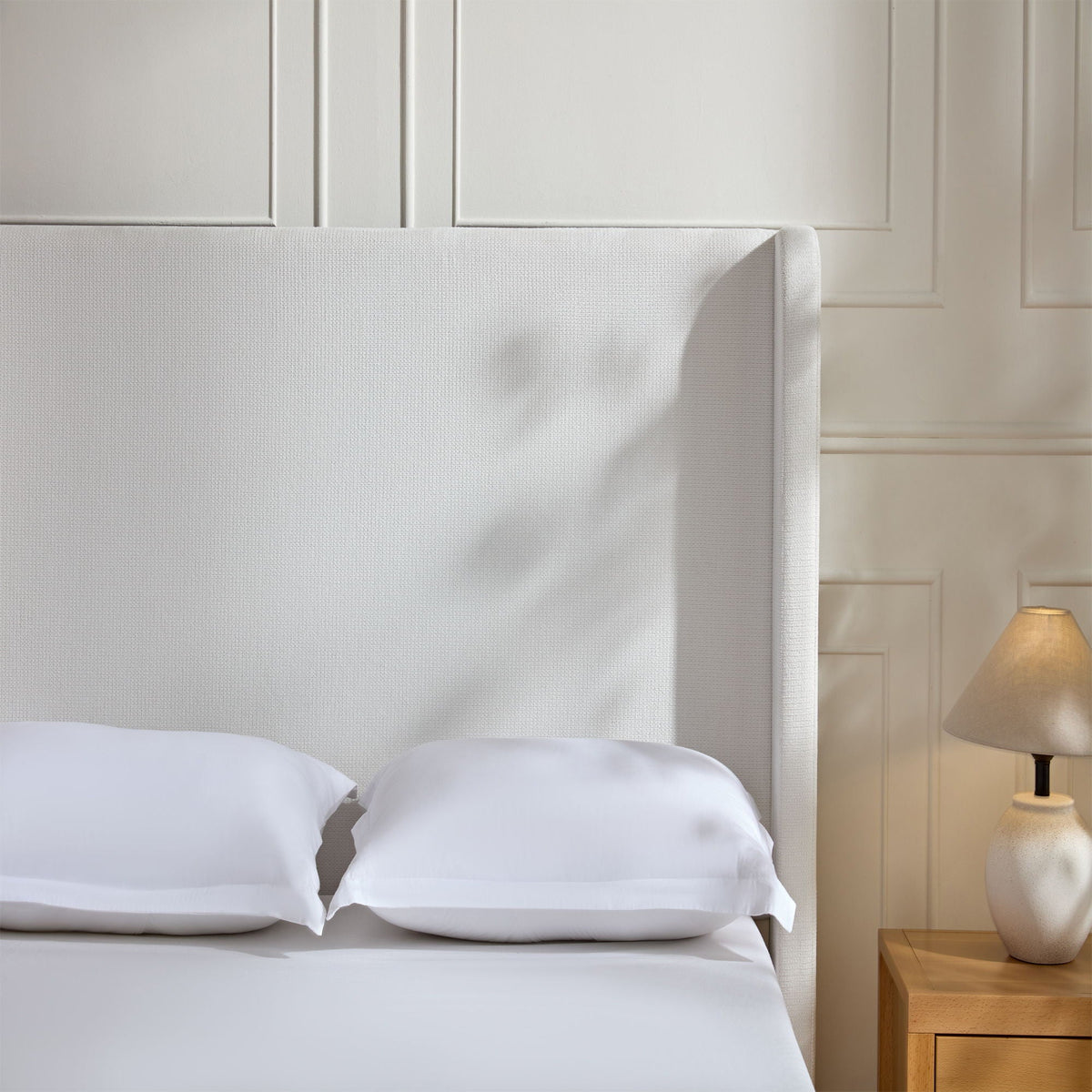 Harper tall upholstered bed with white fabric headboard by HouseOfZazla on Tampa Home & Garden Store