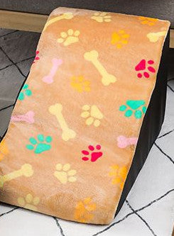 Pet step cover in soft beige fabric with multicolor paw prints and bones, removable and washable on Tampa Home & Garden Store