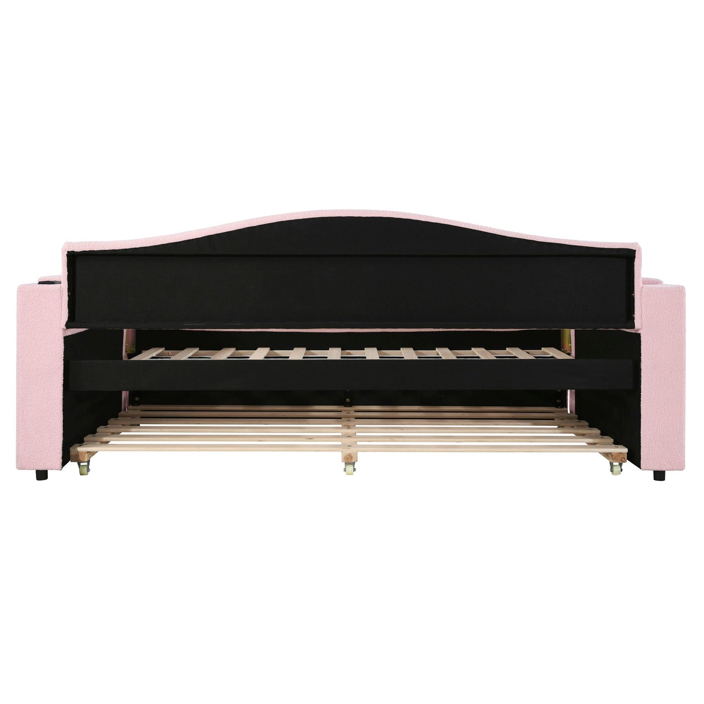 Upholstered pink daybed with black curved headboard, storage armrests and trundle on Tampa Home & Garden Store