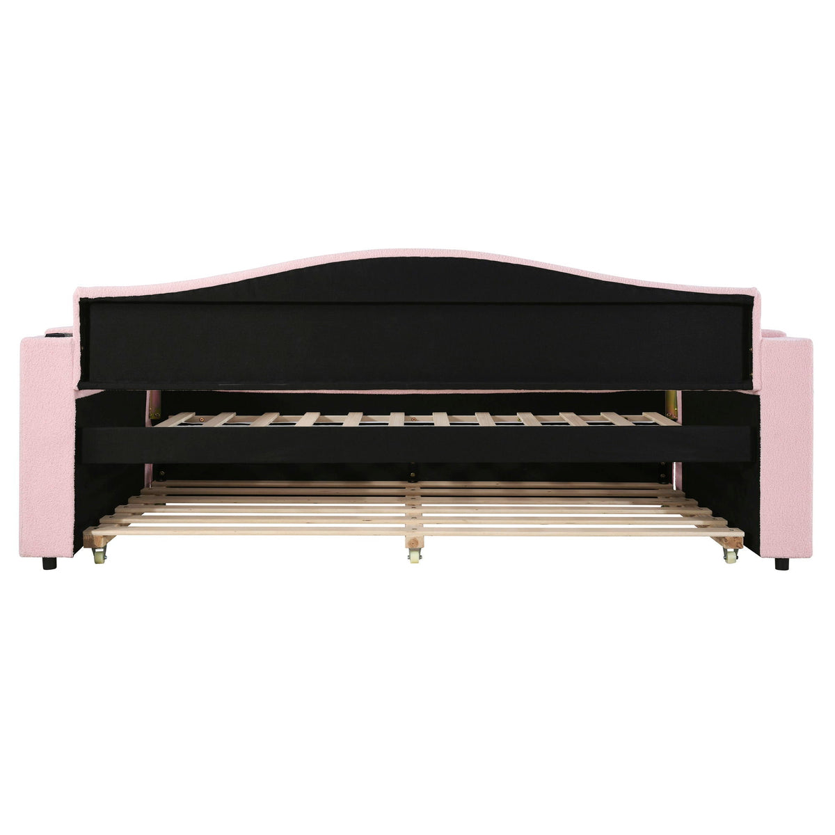Upholstered pink daybed with black curved headboard, storage armrests and trundle on Tampa Home & Garden Store