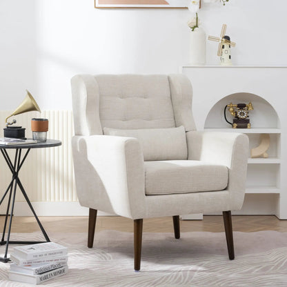 Beige foam-filled mid-century accent chair with dark wooden legs in living room setting on Tampa Home & Garden Store