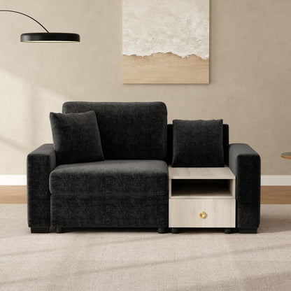 Modular sofa with storage armrest and center console in dark charcoal fabric; light wood storage on Tampa Home & Garden Store