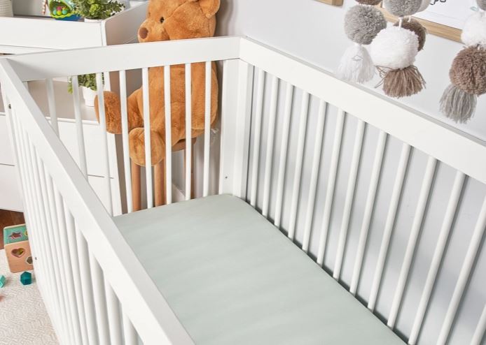 BedGear Hyper-Linen Crib Sheet Light Green for crib use in a white nursery on Tampa Home & Garden Store