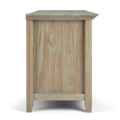 Wide TV stand in solid wood with natural weathered finish and visible grain on Tampa Home & Garden Store