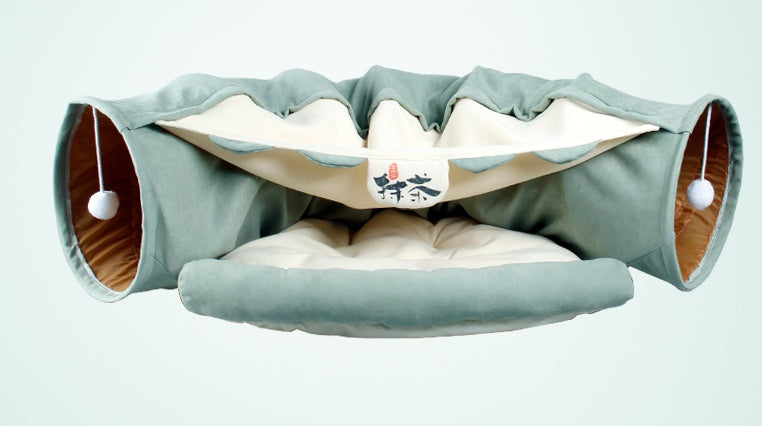 Pet cats tunnel bed collapsible play tunnel in teal with plush interior and pom-pom ends on Tampa Home & Garden Store
