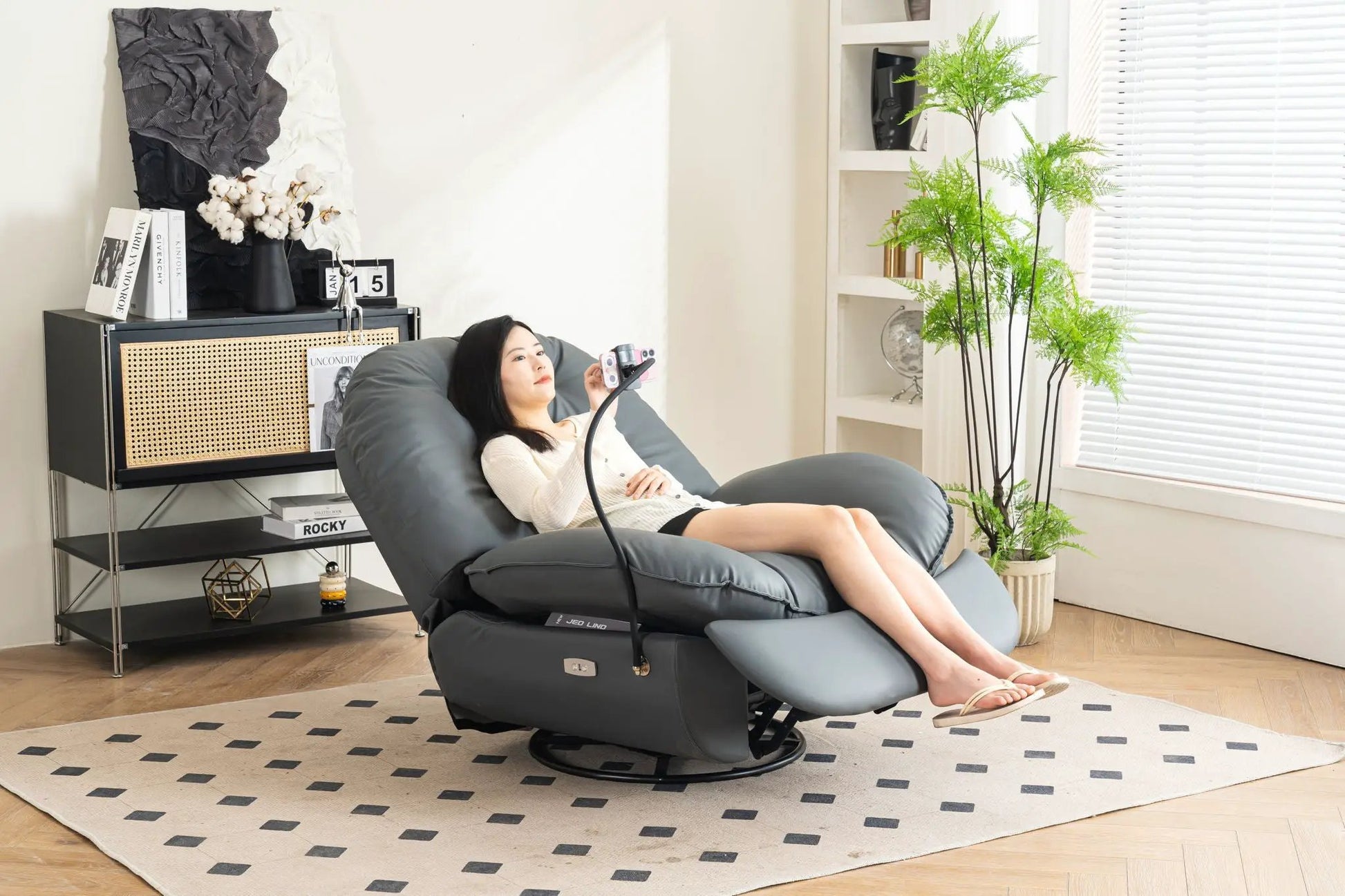 Power recliner swivel glider with USB charger and music player in dark gray faux leather on Tampa Home & Garden Store