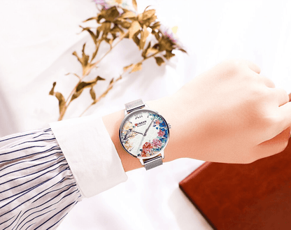 Stevvex women's watch with floral decoupage dial and large Roman numerals, silver mesh band on Tampa Home & Garden Store