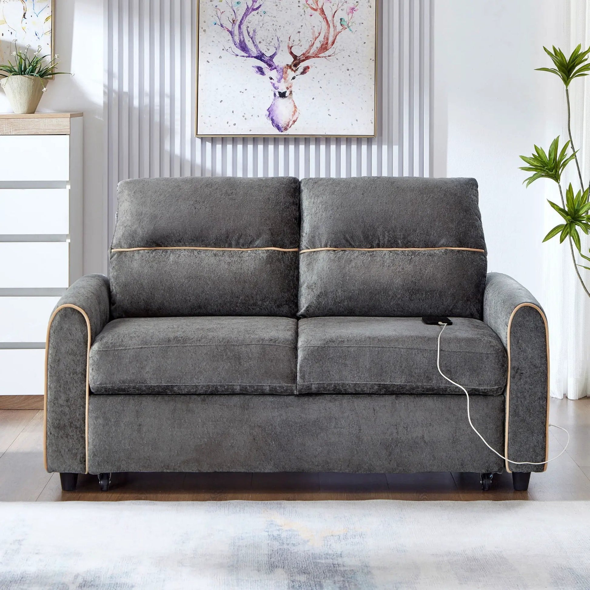 Pull out sofa bed sleeper loveseat in charcoal gray fabric with tan piping and USB cable on Tampa Home & Garden Store