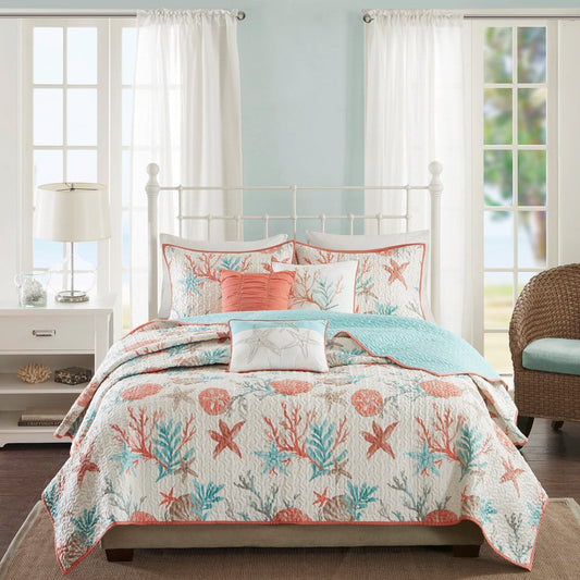 Cotton sateen coral quilt set with decorative pillows on white bed HouseOfZazla on Tampa Home & Garden Store