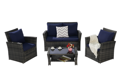 4-piece outdoor patio set with navy cushions on wicker chairs and tempered glass coffee table on Tampa Home & Garden Store