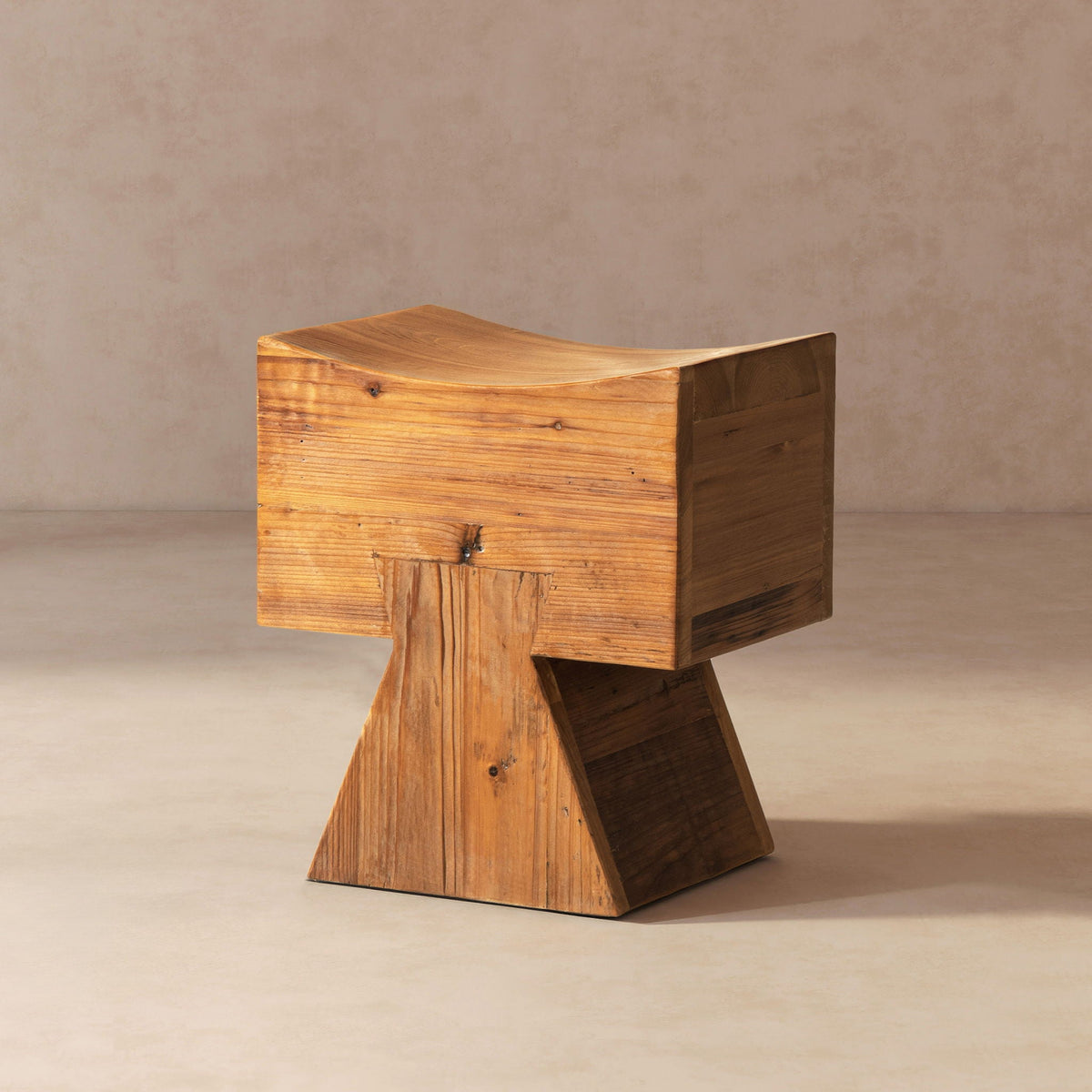 Brown reclaimed wood stool ottoman with sculptural saddle seat by HouseOfZazla on Tampa Home & Garden Store