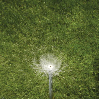 Shrub head sprinkler brass full pattern nozzle sprays water across lawn on Tampa Home & Garden Store