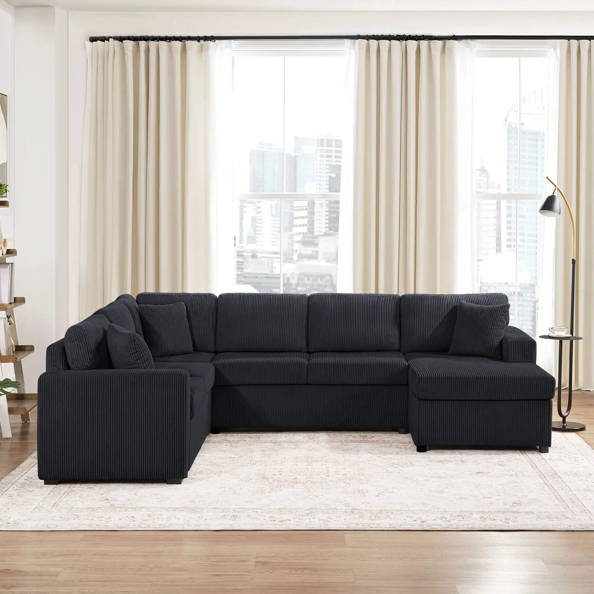 Oversized U-shaped stationary sectional sofa in navy corduroy with chaise and three pillows on Tampa Home & Garden Store