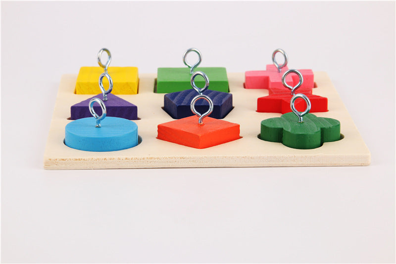 Parrot training toy 9 color wooden blocks with metal rings on a wooden base by Sell My Stuff on Tampa Home & Garden Store