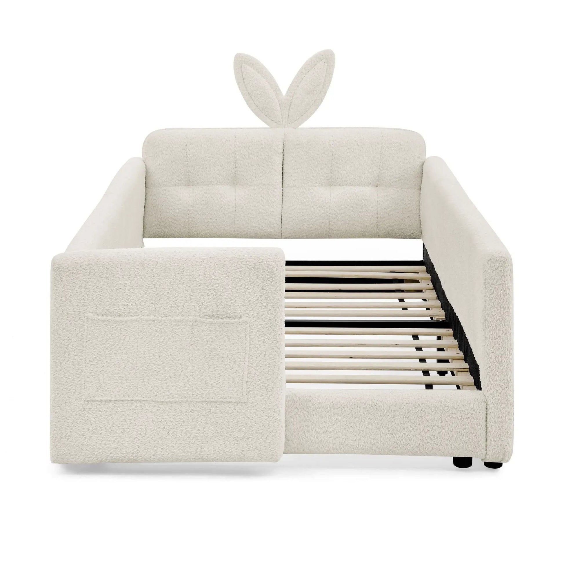 Rabbit ear upholstered platform bed frame in cream boucle with safety rail on Tampa Home & Garden Store