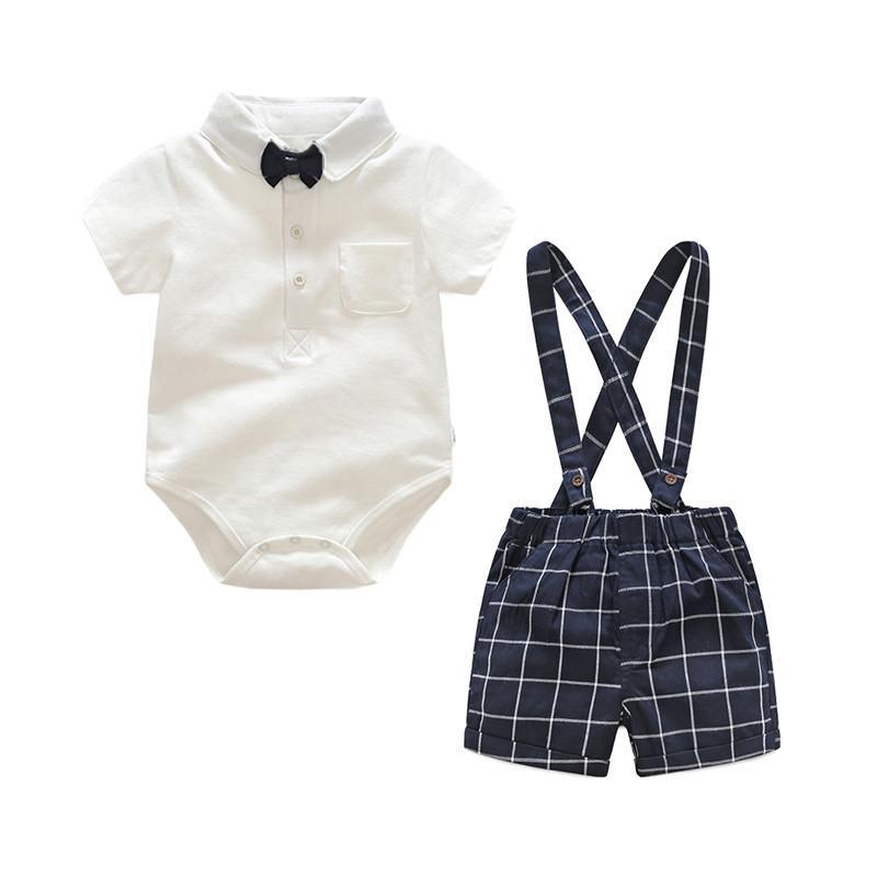 2-piece baby boys outfit: white polo romper with black bow and navy plaid suspenders shorts on Tampa Home & Garden Store