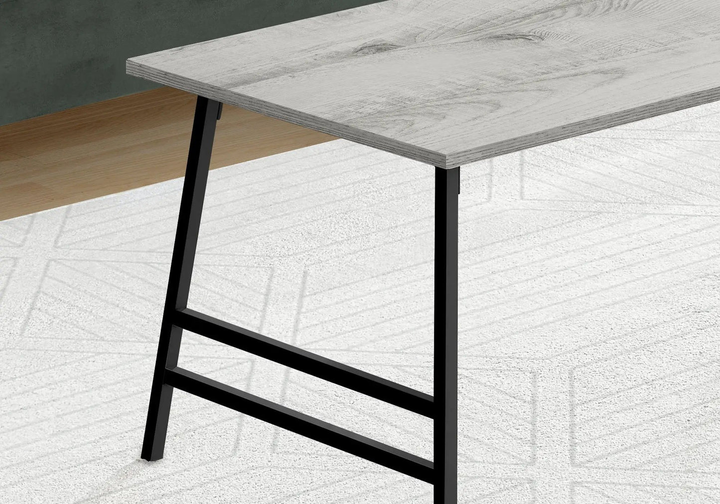 Rectangular modern coffee table by Unique Piece Furniture with grey wood top and black legs on Tampa Home & Garden Store