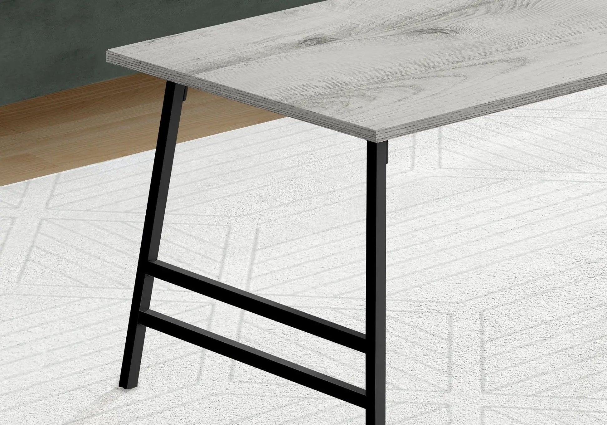 Rectangular modern coffee table by Unique Piece Furniture with grey wood top and black legs on Tampa Home & Garden Store