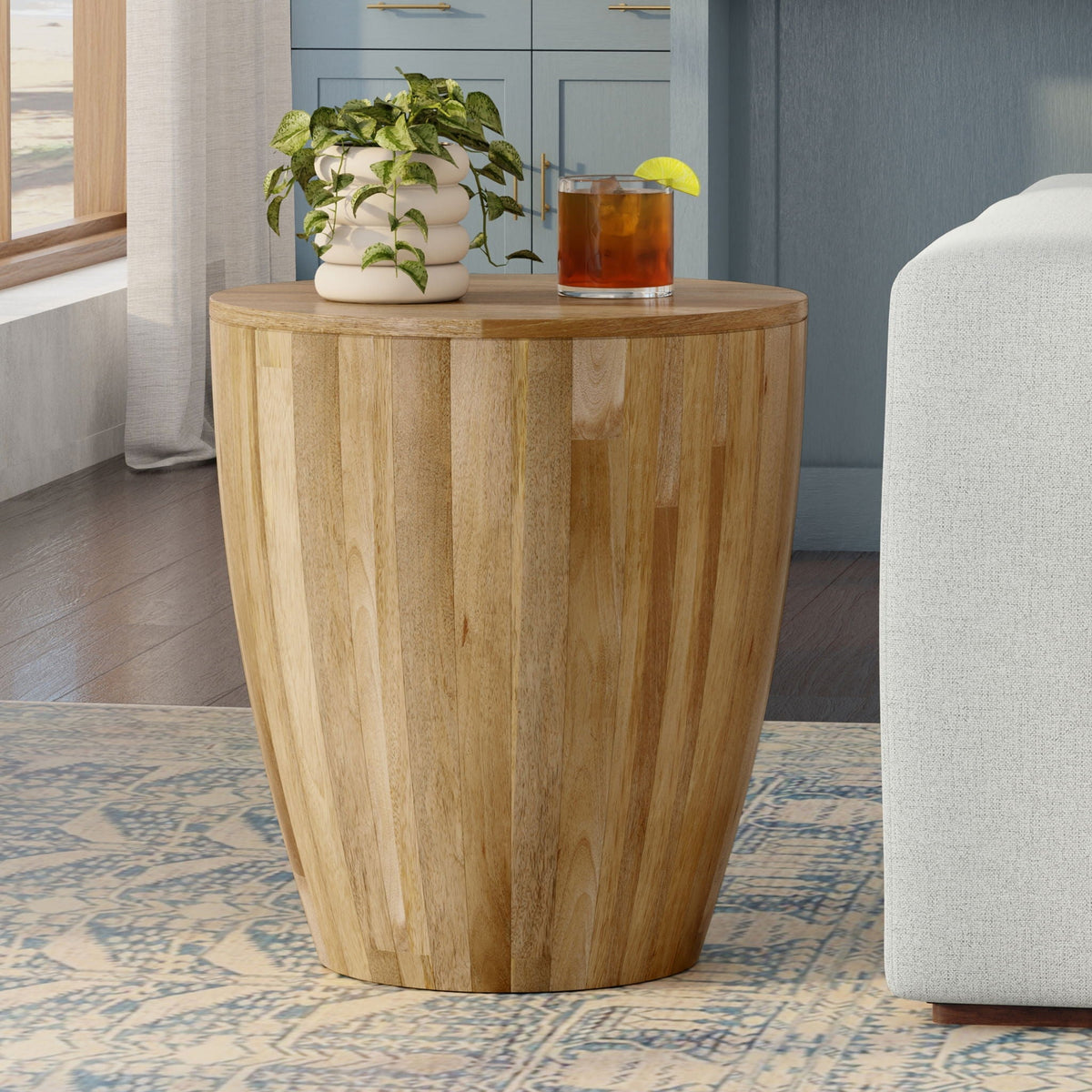 Solid mango wood drum side table natural by HouseOfZazla with plant and iced tea on top on Tampa Home & Garden Store