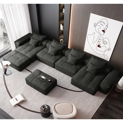 Modern oversized DIY modular sectional sofa in dark grey fabric with cushions in a modern living on Tampa Home & Garden Store