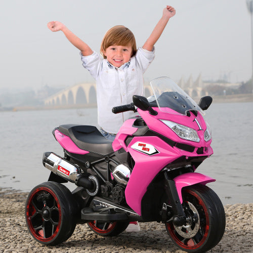 Kids' 12V electric motorcycle in pink with light-up training wheels and smiling rider on a bike on Tampa Home & Garden Store
