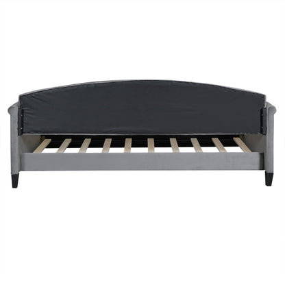 Modern tufted daybed with black leather upholstery and curved backrest on Tampa Home & Garden Store