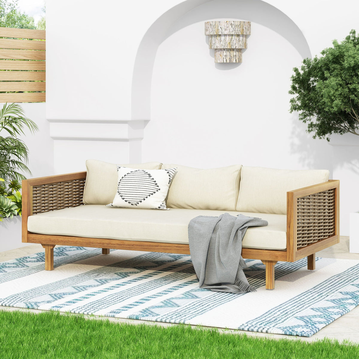 Claremont 3 Seater Daybed in teak acacia wood with water-resistant cushions and woven rattan sides on Tampa Home & Garden Store