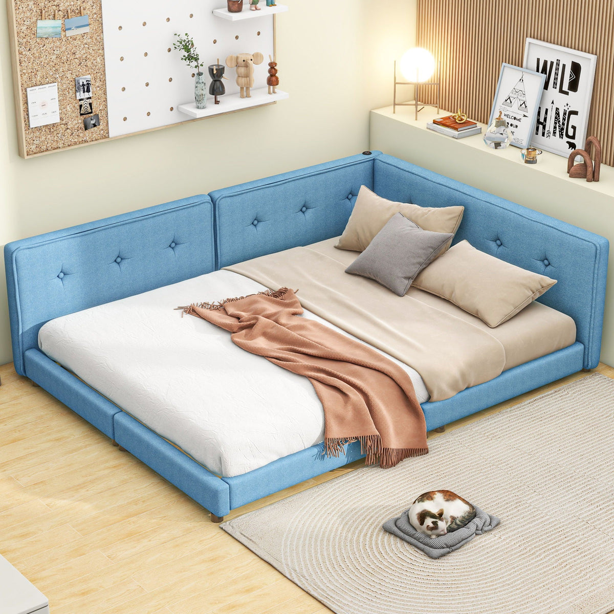 Modern blue upholstered platform bed with tufted sides in a contemporary style on Tampa Home & Garden Store