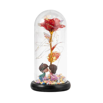Eternal Rose LED foil flower under glass dome with two kissing figurines on Tampa Home & Garden Store