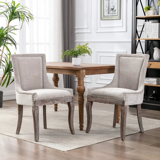 Pair of Ultra Side Dining Chairs Thickened Beige Fabric with nailhead trim and wooden legs on Tampa Home & Garden Store