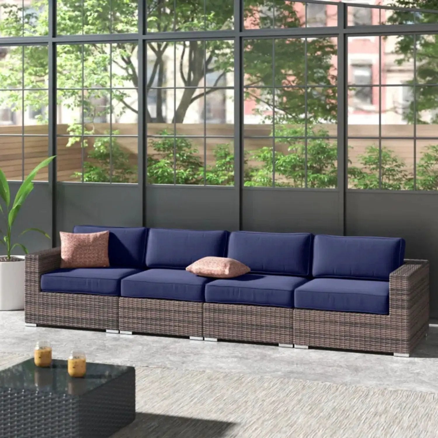 Stationary wicker patio sectional with navy Sunbrella cushions by Unique Piece Furniture on Tampa Home & Garden Store
