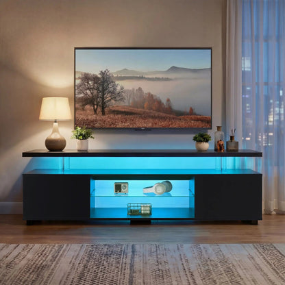 TV stand with LED lighting and large side cabinet, black finish with LG TV above on Tampa Home & Garden Store