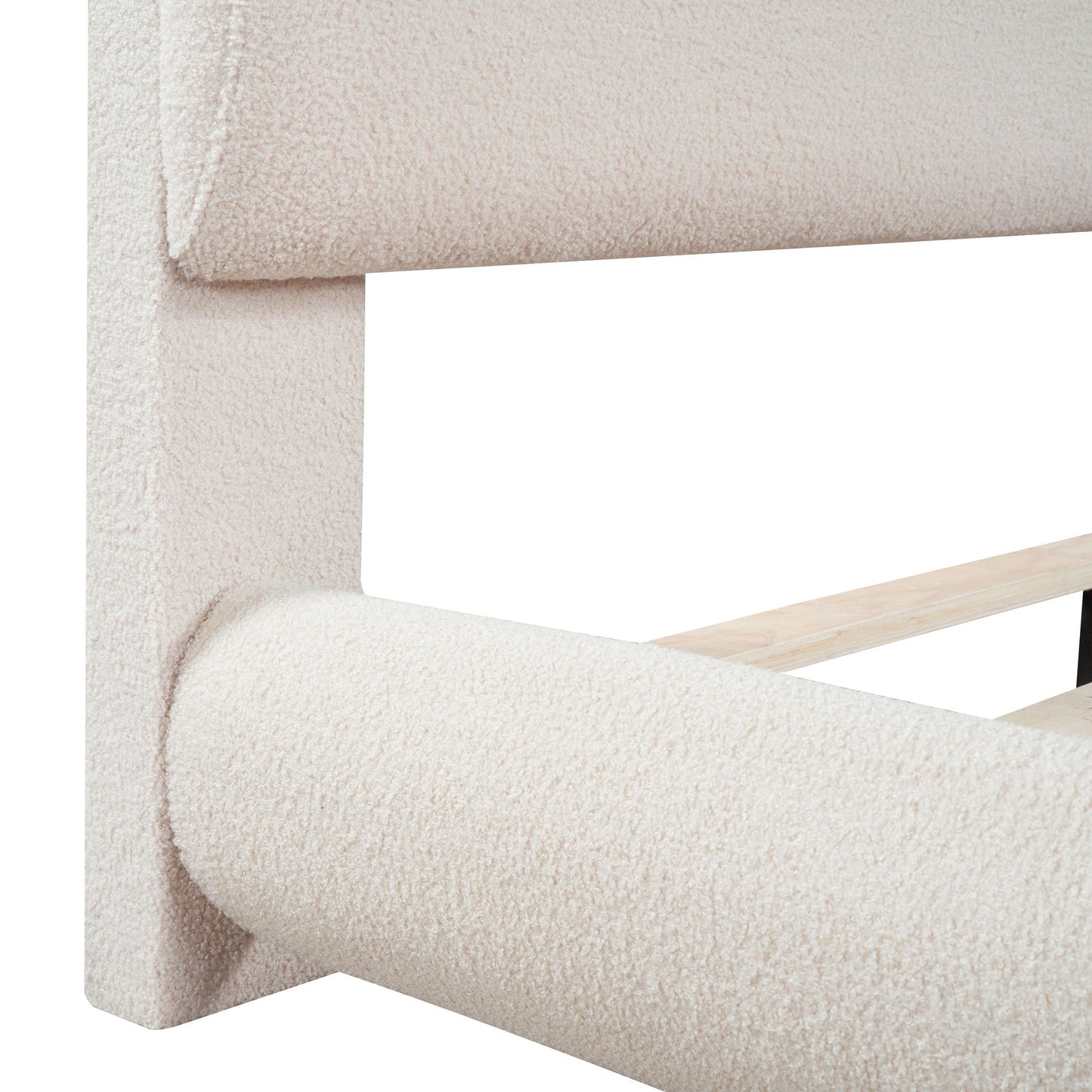 Upholstered platform bed in beige boucle fabric with thick frame and curved silhouette on Tampa Home & Garden Store