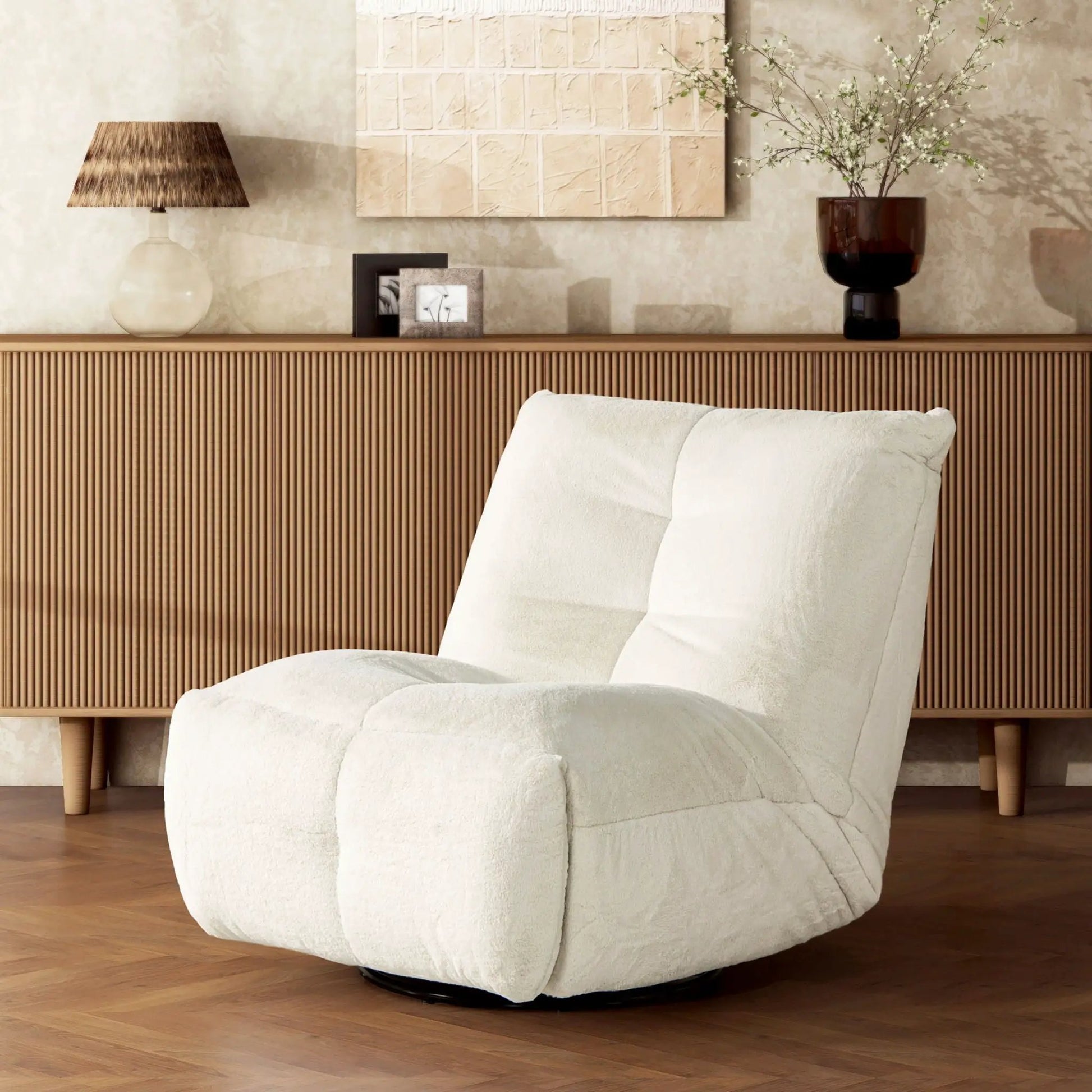 Rearden Swivel Glider Chair in white plush fabric with black base on Tampa Home & Garden Store