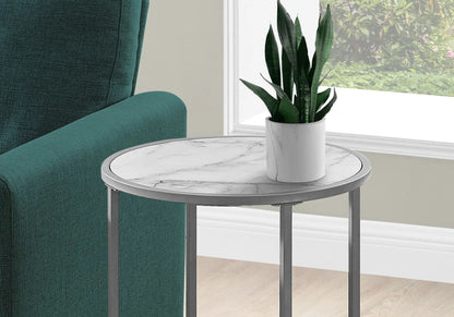 Round Accent Side Table with white marble top and metal frame beside teal sofa with plant on Tampa Home & Garden Store