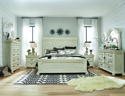 Bronwyn Panel Bed Unique Piece Furniture in distressed white with dressers in a room on Tampa Home & Garden Store