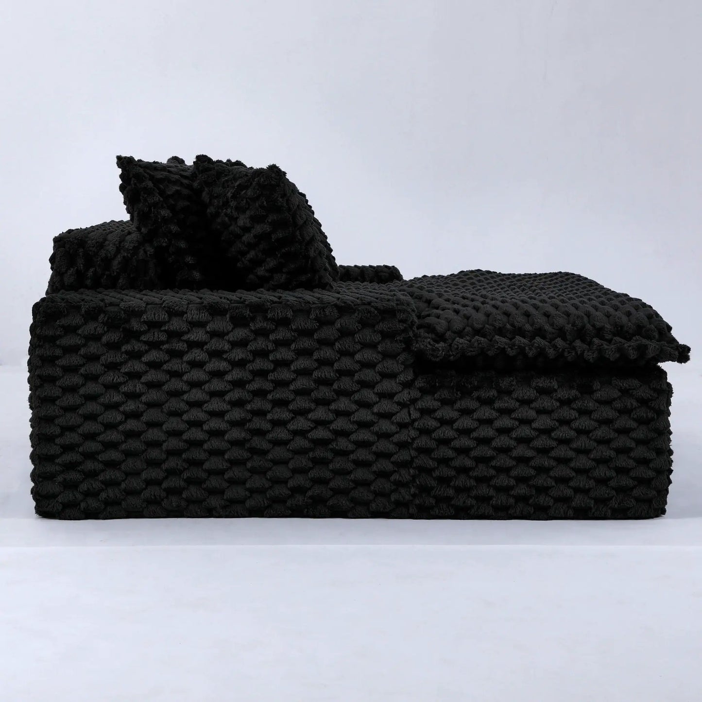 Harbor Luxury Sofa Turtle Fleece Fabric swatches stacked in dark charcoal textured upholstery on Tampa Home & Garden Store