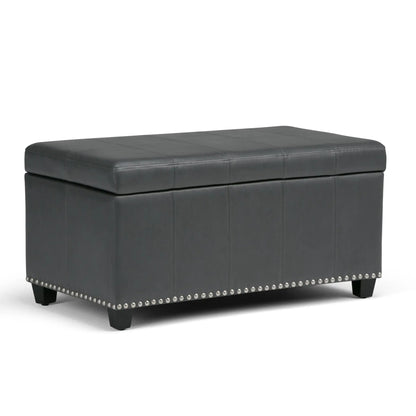 Amelia storage ottoman bench in dark gray leather with quilted stitching and nailhead trim on Tampa Home & Garden Store