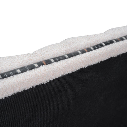 Upholstered Platform Bed With Trundle beige sample with measuring tape on rolled carpet on Tampa Home & Garden Store