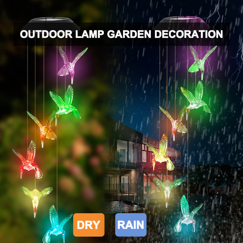 Outdoor solar wind chime lamp with colorful hummingbird shapes for landscape garden decor on Tampa Home & Garden Store