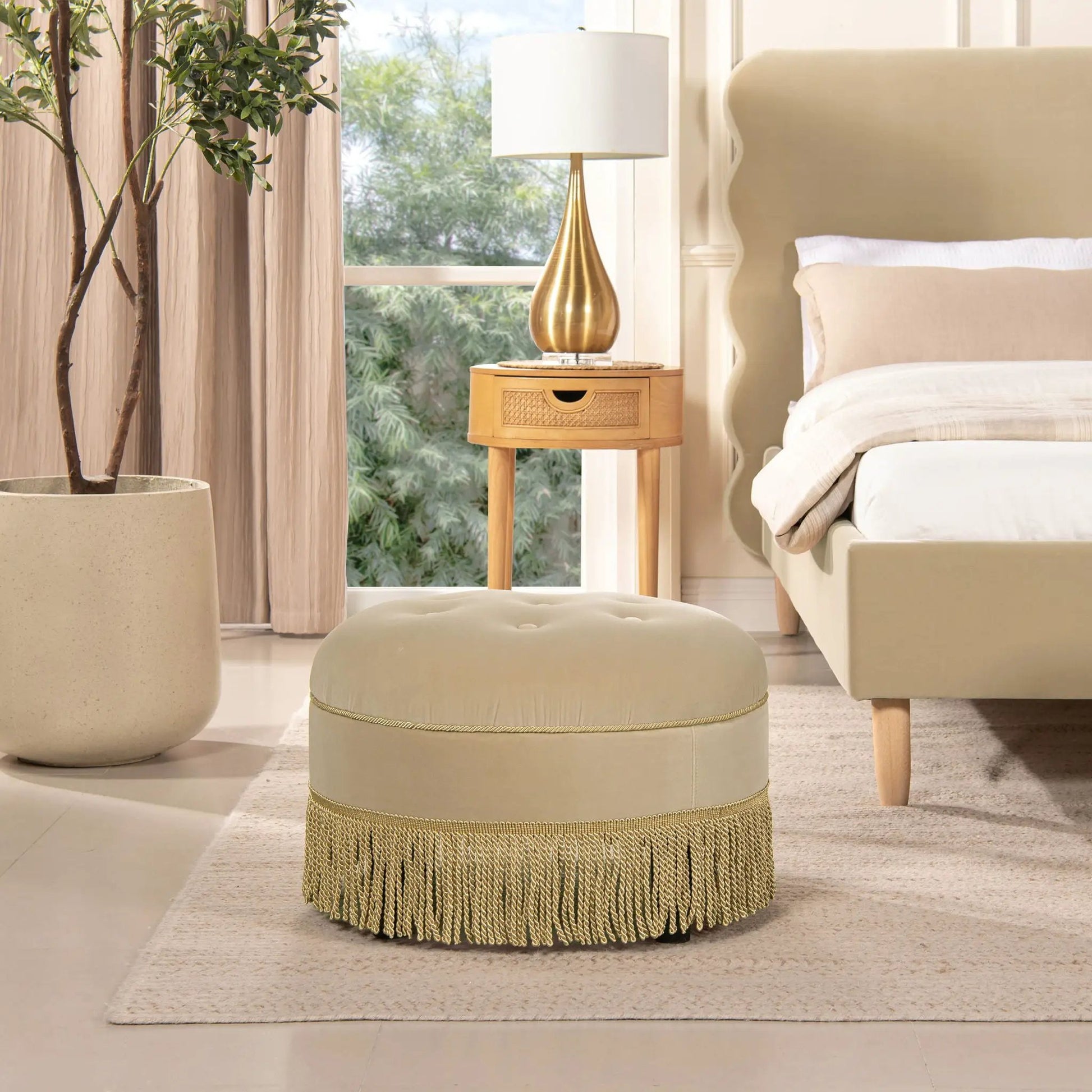 Yolanda round upholstered accent ottoman beige fabric with fringe trim by Unique Piece Furniture on Tampa Home & Garden Store