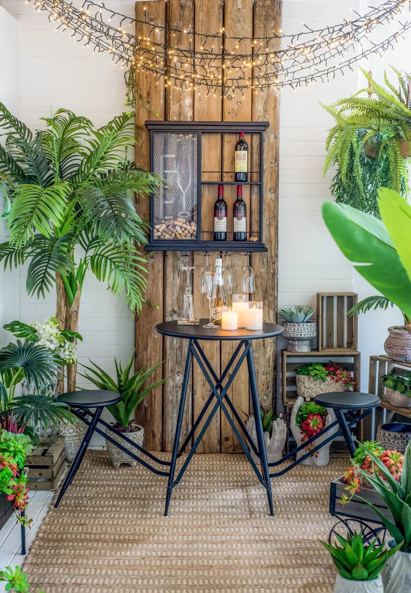 Floating black wall wine shelf with glass holder and display for 3 bottles on wood backdrop on Tampa Home & Garden Store