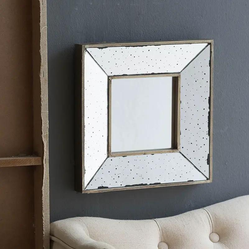 Distressed Accent Mirror wall mirror with white speckled frame and inner gold trim on Tampa Home & Garden Store