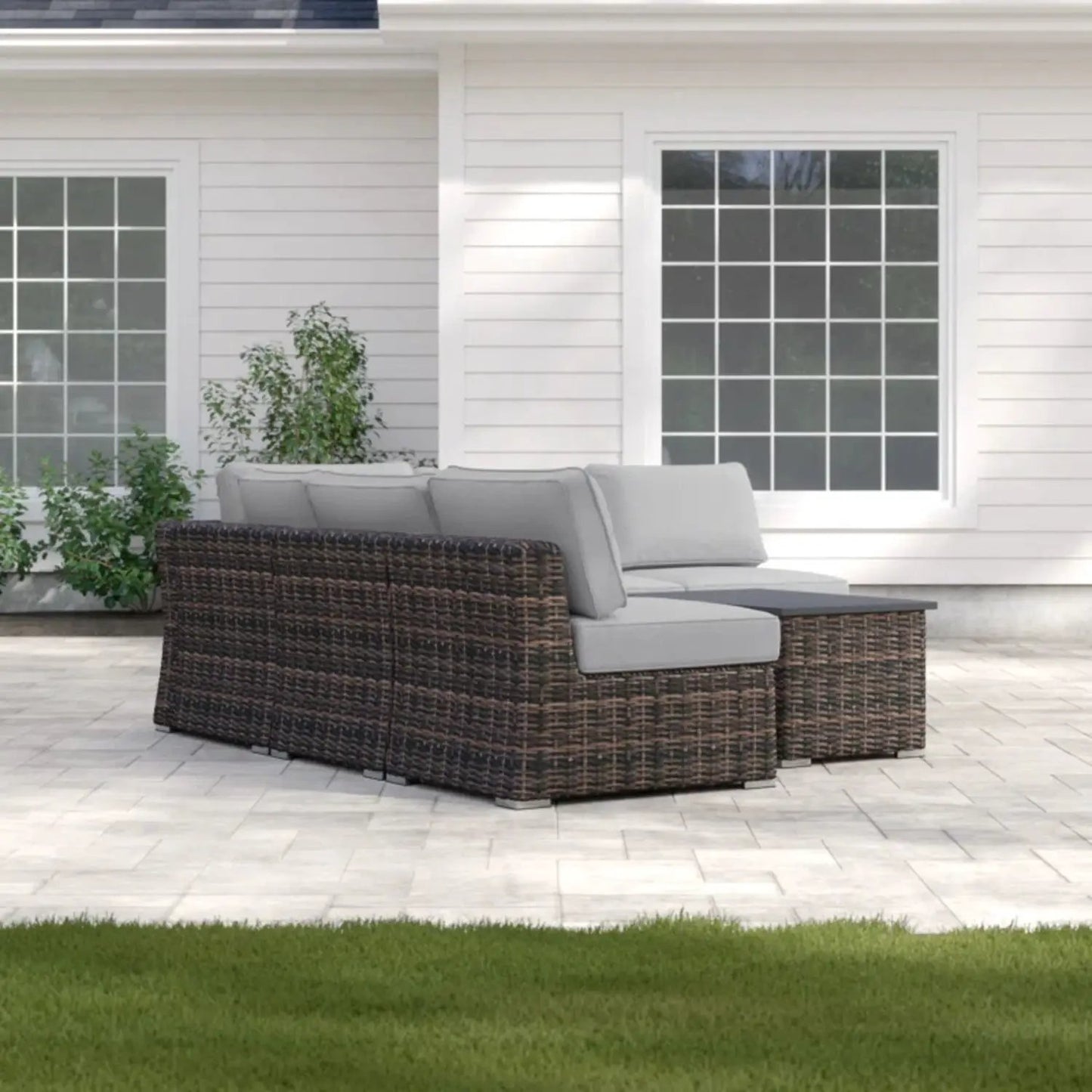 2-piece wicker sectional sofa with gray cushions and coffee table by Unique Piece Furniture on Tampa Home & Garden Store